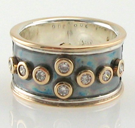 the finished ring with diamonds